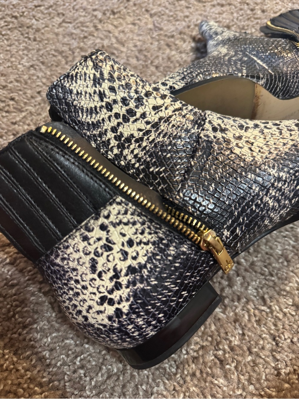 Calvin Klein Black and White Snake-Print Ankle Booties with Gold Zip